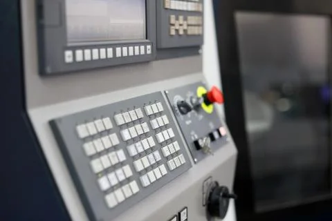 Modern lathe machine with CNC control panel Stock Photos