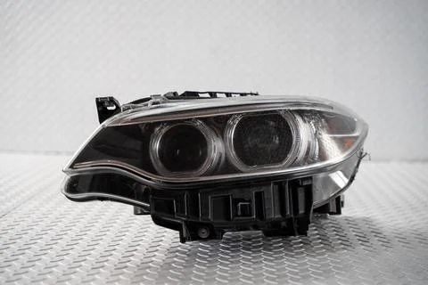 Modern LED car headlight isolated on white background Stock Photos