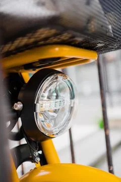 Modern LED Front Light of an Electrical Bike Close Up Stock Photos
