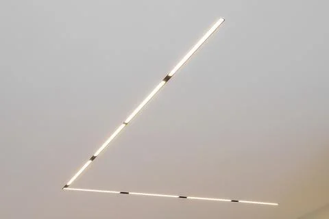 Modern LED lamp on the ceiling in the interior Stockfoto's