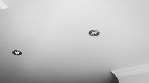 Modern light bulbs in the ceiling Stock Photos