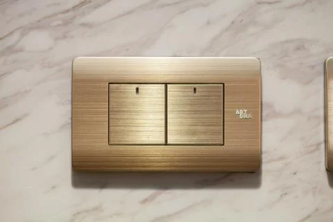 Modern light electrical switch with modern marble background. Foto stock