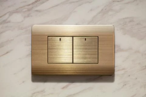 Modern light electrical switch with modern marble background. Foto stock
