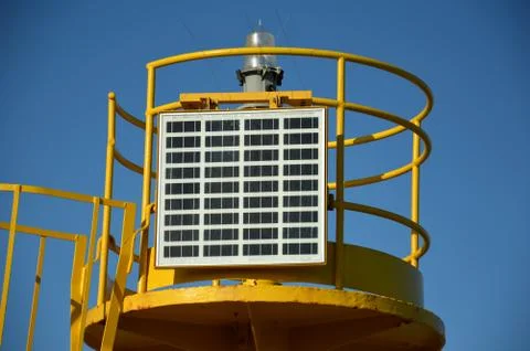 Modern lighthouse with solar panel Stock Photos