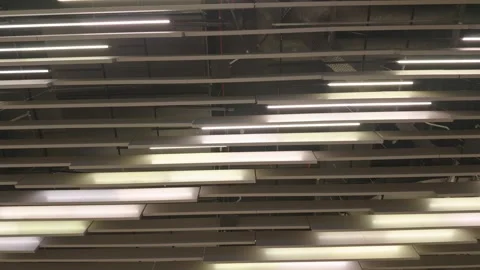 Modern Linear Ceiling Lights in Contemporary Commercial Interior Stock Footage 347245525