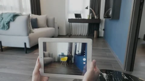 Modern Living Room with Tablet Interaction Stock Footage 322855630
