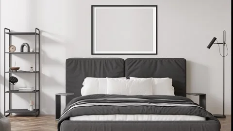 Modern loft style bedroom featuring empty picture frame for adding artwork Stock Footage 310805367