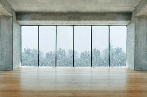 Modern lofty interior with large windows with snow and tree view Stock Photos