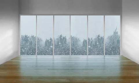 Modern lofty interior with large windows with snow and tree view Stock Photos