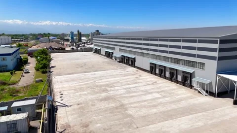 Modern Logistics Warehouse with Loading Docks Stock Footage 339245207