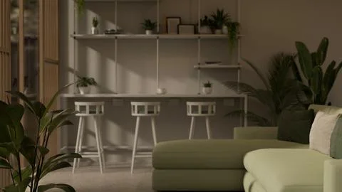 A modern lounge seating area features a green sofa, a table with stools, an.. イラスト素材