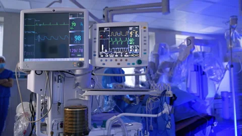 Modern lung ventilating machine with two screens on works in the surgery room.  Stock Footage 267298513