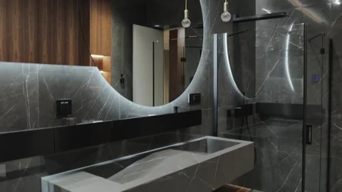 A Modern Luxury Bathroom that features Elegant Design Elements for a refined Stock Footage 295539169