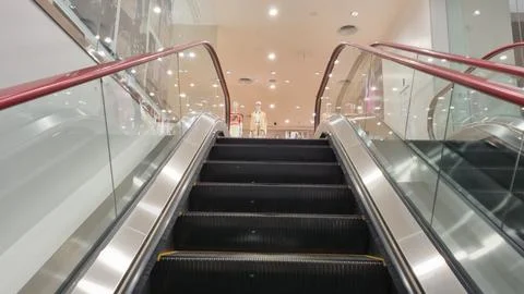 Modern luxury escalators with staircase. Stock Photos