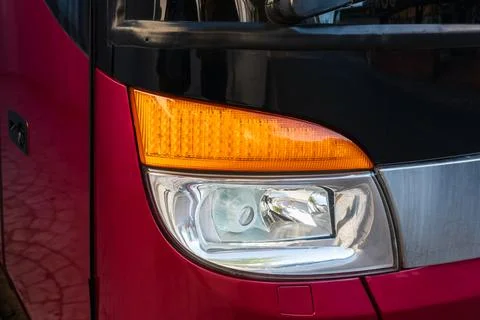 Modern luxury front bus headlight or headlamp led. Bus public transportation Stock Photos