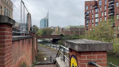 Modern luxury housing development in the UK large city by the river Stock Footage 332117631