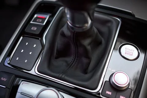 Modern luxury interior engine start stop button shift gear of manual gearbox and 库存照片