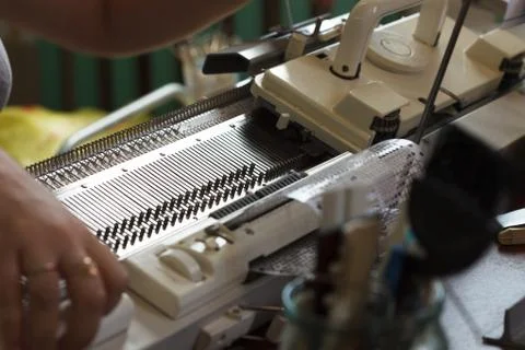 Modern machine for knitting on weaving mill Stock Photos