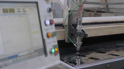 Modern machine laser metal sheet cnc cutting steel plate. High precision cutting Stock Footage 162865575
