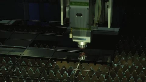 Modern machine laser metal sheet cnc cutting steel plate. Burn laser cutter work Stock Footage 247005981