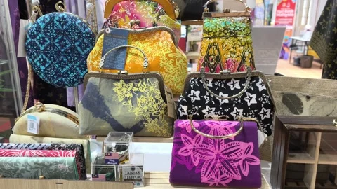 Modern Malaysian Batik Handbag with Unique Flora Motifs Stock Footage 323783016