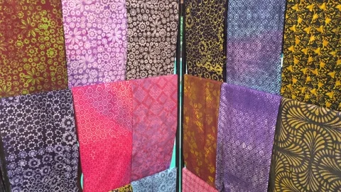 Modern Malaysian Batik Using Terap and Canting Techniques on Mannequin Stock Footage 323782961