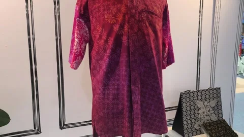 Modern Malaysian Batik Using Terap and Canting Techniques on Mannequin Stock Footage 323782986