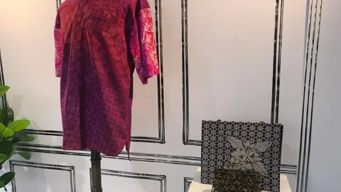 Modern Malaysian Batik Using Terap and Canting Techniques on Mannequin Stock Footage 323783152