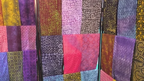 Modern Malaysian Batik Using Terap and Canting Techniques on Mannequin Stock Footage 323783298