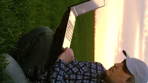 Modern man agronomist scientist analyzing green wheat production growth use Stock Footage 301237610
