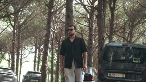 Modern Man in Sunglasses – Forest B-Roll Video stock 318593249