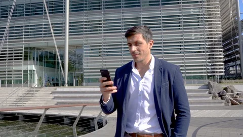 Modern man using business app on phone 4K Stock Footage 96053665