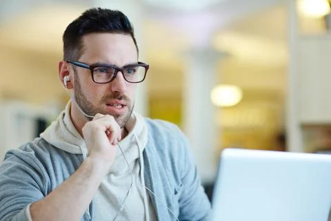 Modern Man using Video Call Technology Stock Photos