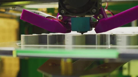 Modern manufacturing and technology. The machine prints complex parts from Stock Footage 256976362