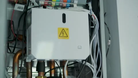 Modern mechanical room interior showing a complex HVAC system with heat pump Stock Footage 340113039