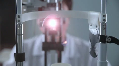 A modern medical device for eye checking. Unrecognizable doctor working with Видео 68445061