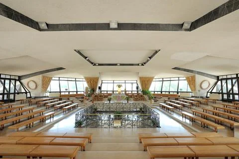 Modern Memorial over old octagonal church Stock Photos