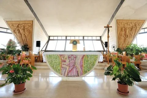 Modern Memorial over old octagonal church Stock Photos