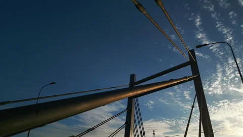 Modern metal cable bridge on blue sky background at sunset, Lublin, 4k Stock Footage 252659683