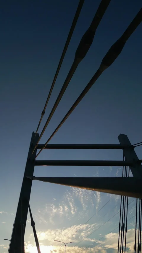 Modern metal cable bridge on blue sky background at sunset, Lublin, 4k Stock Footage 339768723