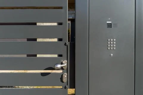 Modern Metal Security Gate with Digital Keypad Stock Photos