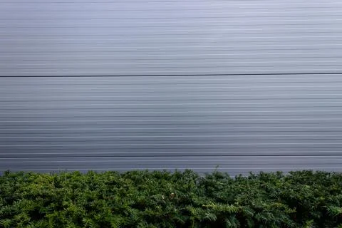 Modern metal wall of building Stock Photos