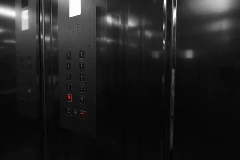 Modern metallic elevator with call button panel Foto stock
