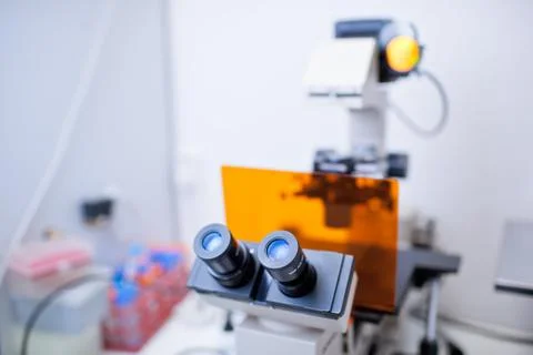 Modern microscope in a lab  (color toned image; shallow DOF) Stock Photos