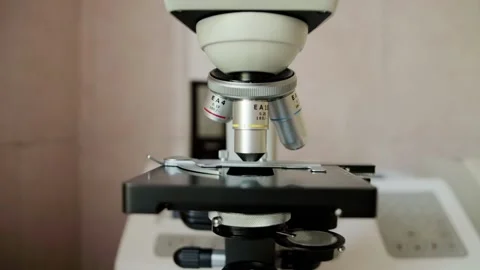 Modern microscope with multiple magnification in the laboratory of medicine for Stock Footage 317088700
