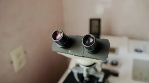 Modern microscope with multiple magnification in the laboratory of medicine for Stock Footage 317806788