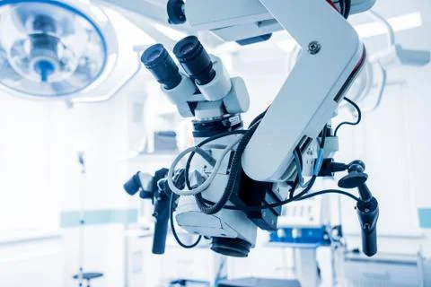 Modern microscope for operations in surgery room at the hospital. Stock Photos