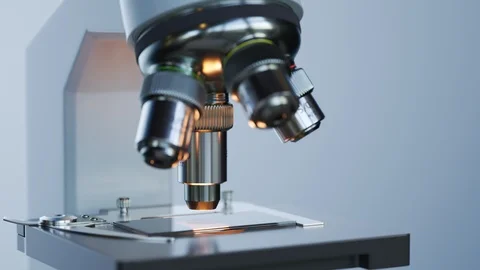 "A modern microscope in a sterile laboratory room analyzing cell samples. 4KHD" 動画素材 98944823