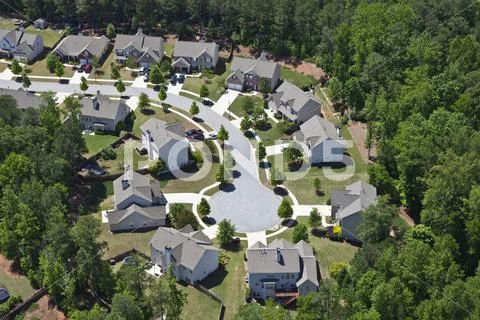 Modern middle class suburbia aerial eastern usa Stock Photos