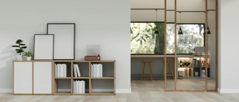 A modern, minimal room with blank frames mockup and a vinyl record player o.. Illustrazione stock